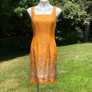 Ann Taylor yellow/orange silk over rayon complex print hem size 4.